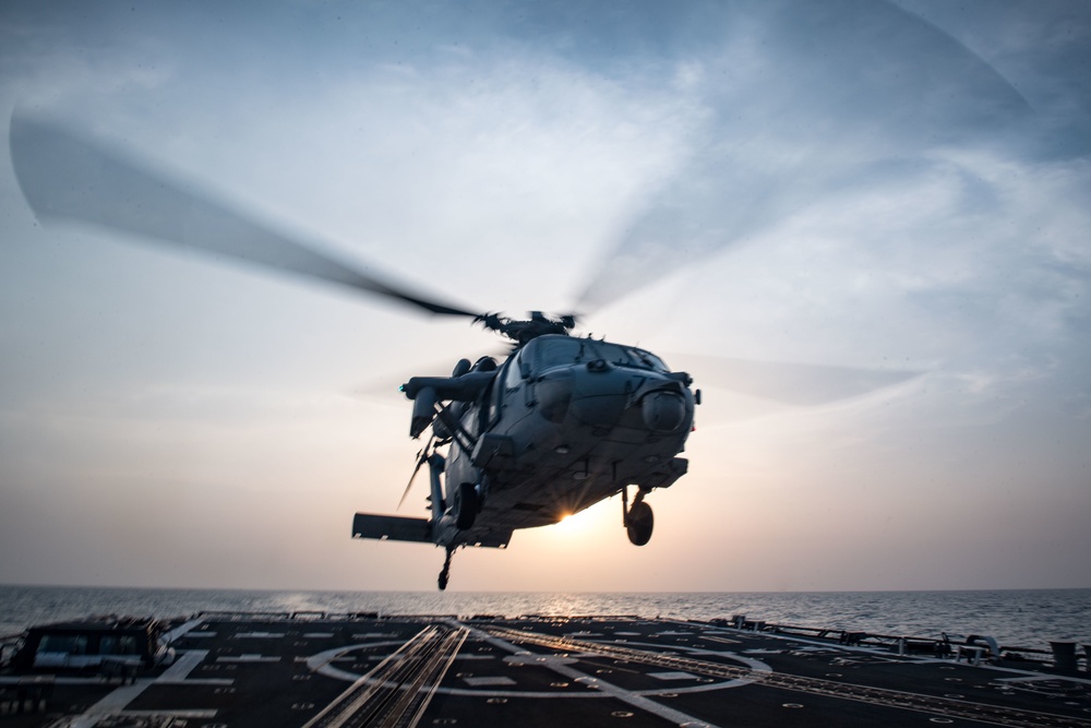 DVIDS Images USS Jason Dunham DDG 109 Helo Ops At Sunset Image 7