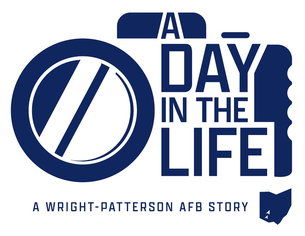 A Day In The Life Logo - Blue