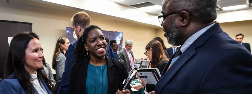 Personnel conduct educational outreach with students Personnel conduct educational outreach with students