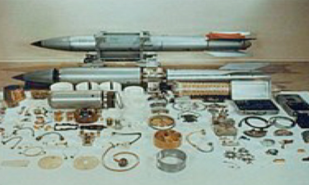Bomb with parts on table Bomb with parts on table