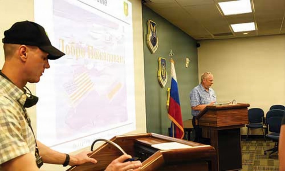 Russian interpreters deliver a presentation Thumbnail Russian interpreters deliver a presentation Thumbnail