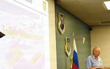 Russian interpreters deliver a presentation Thumbnail