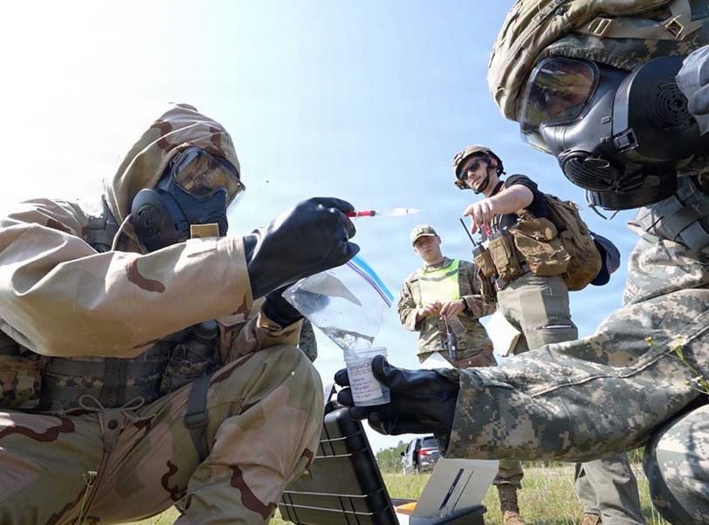 Military personnel participating in DTRA technology testing exercise.