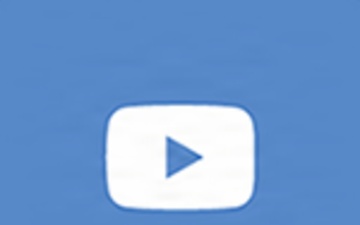 White Youtube Icon on Blue background