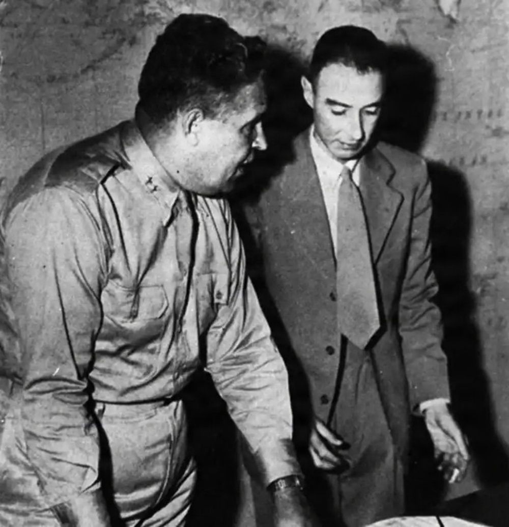 Gen. Leslie Groves, military head of the Manhattan Project, with physicists J. Robert Oppenheimer. Circa 1944. Gen. Leslie Groves, military head of the Manhattan Project, with physicists J. Robert Oppenheimer. Circa 1944.