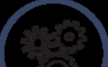Interconnected gears within a circular icon represent Defense Threat Reduction Agency's research and development mission.