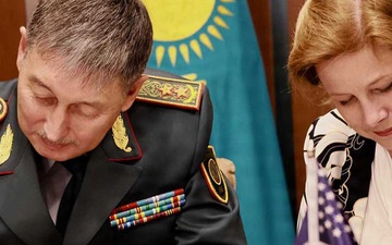 DTRA Director signing agreement with foreign leader