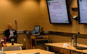 Employees gathered to meet in conference room