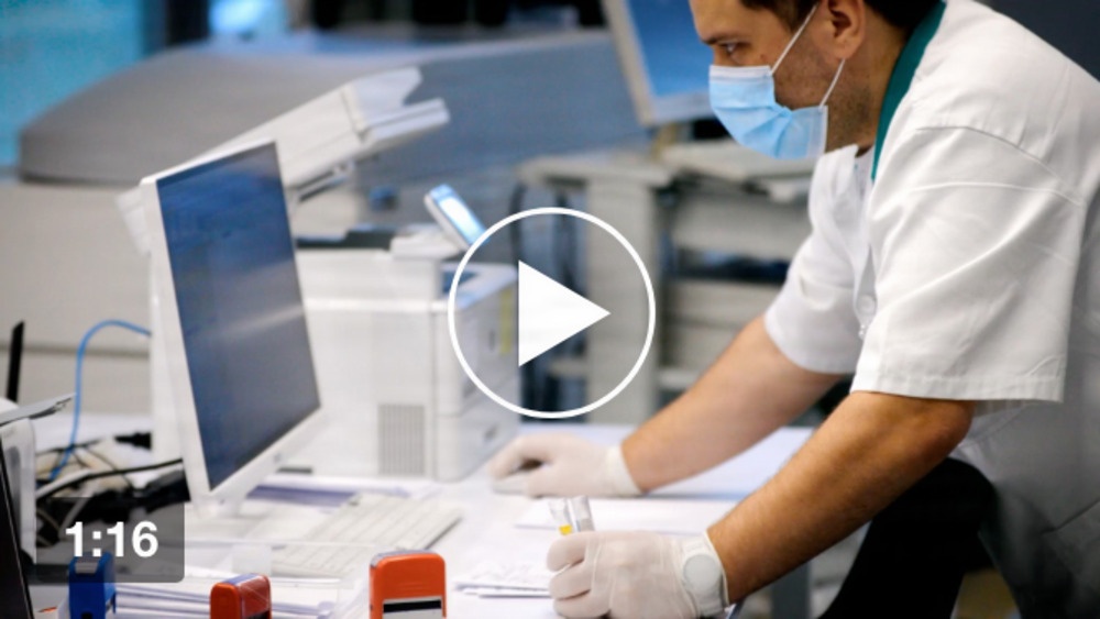 A NEW DOMAINE FOR THE PANDEMIC ERA video poster image - scientist at monitor A NEW DOMAINE FOR THE PANDEMIC ERA video poster image - scientist at monitor