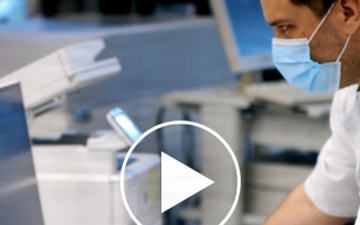 A NEW DOMAINE FOR THE PANDEMIC ERA video poster image - scientist at monitor