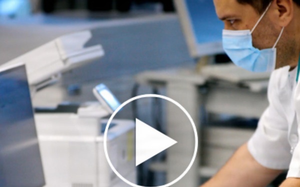 A NEW DOMAINE FOR THE PANDEMIC ERA video poster image - scientist at monitor