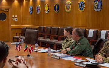 Personnel around a conference table