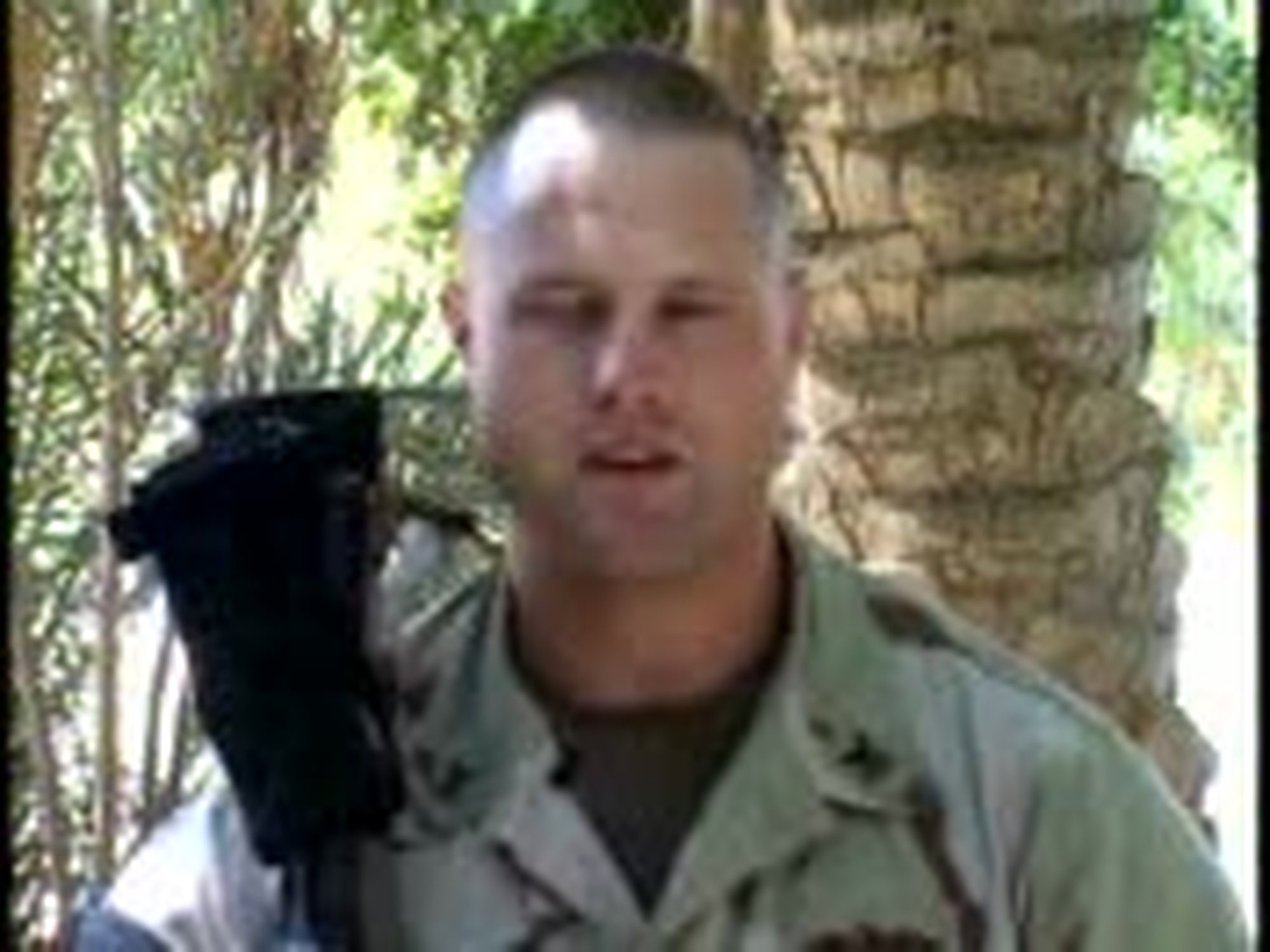 Petty Officer Doug Newman of the 30th Naval Contruction Regiment at Camp Fallujah, Iraq sends greetings to his family and police co-workers in Tuscon, AZ.  Video from II Marine Expeditionary Force Public Affairs.