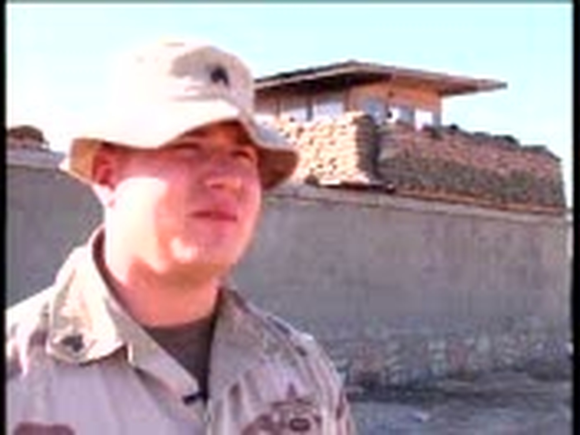 Soldiers man the watch towers at Forward Operating Base Ghazni.  Scenes include Soldiers scanning the base perimeter with binoculars, using hand-held radios, and in the guard tower.  Also see &quot;Watch Tower&quot; Package in this section.<br /><br /><br />
