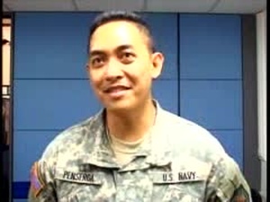 Troops Watch Kids Graduate on Internet
