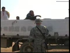 Soldier Escorts Locals