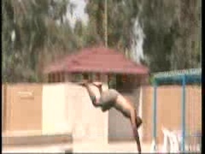 Soldiers With The 101st Airborne Division Help Iraqis Cool Off in Baghdad