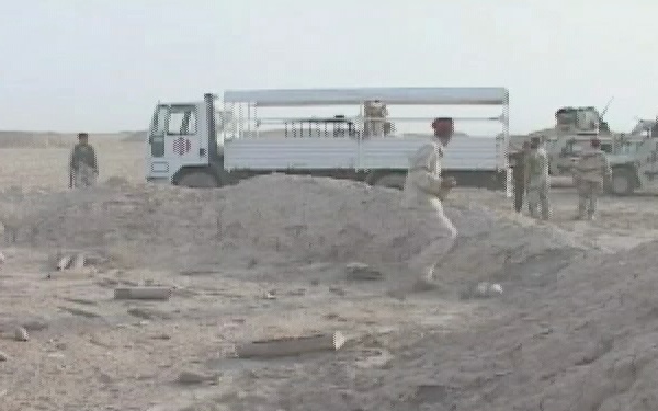 IA and Iraqi Police Conduct a Traffic Control Point, Find Munitions Cache