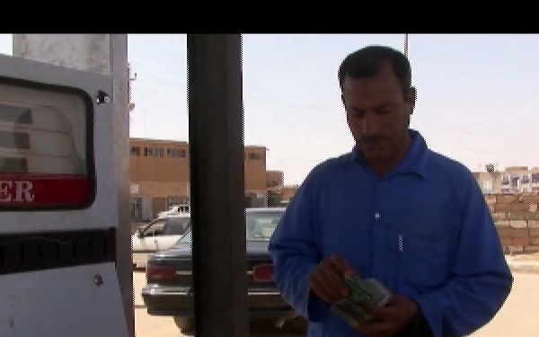 Iraqis Buy Gas
