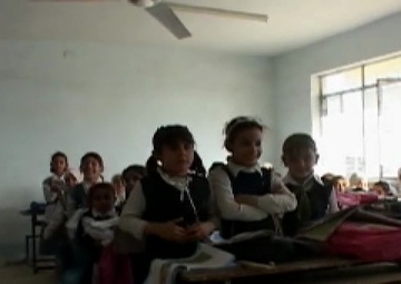 US Soldiers Help Iraqi Army Deliver Blankets and School Supplies