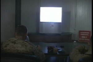 OU and UF Fans Watching the BCS Championships on Al Asad