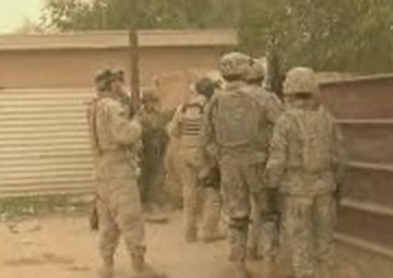 Soldiers Conduct a Cordon and Search Operation