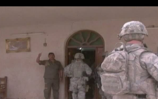 Soldiers Discuss Neighborhood Issues with Area Leader