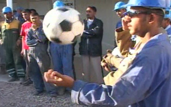 Container Repair Yard Workers Get Soccer Balls