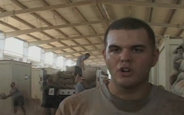 Removing Sandbags at FOB Silo Package