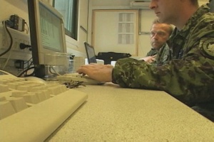 Combined Endeavor 2009: Foreign Joint Service Operators Work Inside a Commu
