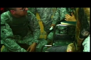 Or. Guard Delivers Aid to Deaf Iraqi Children