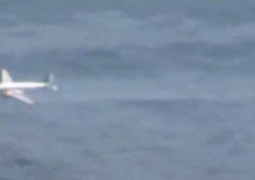 DC3 Aircraft Deploys Dispersant on Oil Sheen