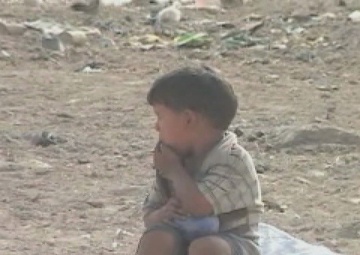 U.S. Soldiers Hand Out Humanitarian Aid Meals