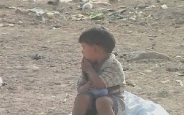 U.S. Soldiers Hand Out Humanitarian Aid Meals