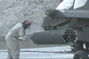 Spc. Joseph Reloads Apache Helicopter Ammunition