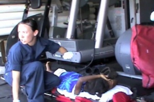 Crew Members From Cutter Mohawk Prepare an Injured Haitian Girl for MEDEVAC