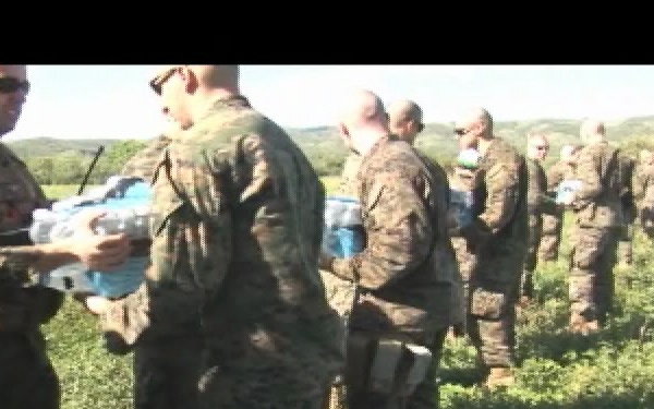 CH-53 E Lands in Cortes De Fer for a Food and Water Drop
