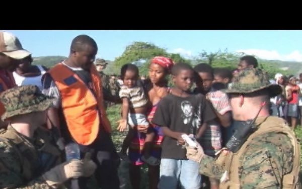 Marines Hand out Food and Water at Cortes De Fer