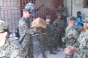 Combat Logistics Battalion 22, Unload Meals, and Water with Local Haitians