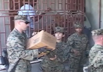 Combat Logistics Battalion 22, Unload Meals, and Water with Local Haitians