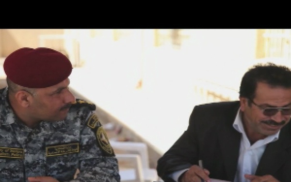 U.S. Soldiers and Iraqi Federal Police Officers Distribute Humanitarian Aid