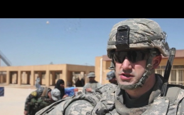 U.S. Soldiers and Iraqi Federal Police Officers Distribute Humanitarian Aid