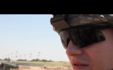 U.S. Soldiers and Iraqi Police Check Progress of Bridge Construction