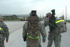 Spc. Josiah Greene prepares for the Dancon Ruck March