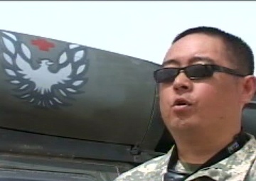 Army MEDEVAC Medic Treats Wounded in the Skies - Package, Short