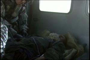 MEDEVAC Pilot Picks Up Wounded Civilian, Package