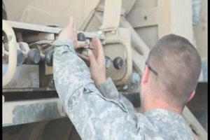 U.S. Soldiers Lift Fallen Trailor, Part 3