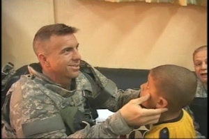 Air Force Medic Examines an Iraqi Boy With Heart Problems