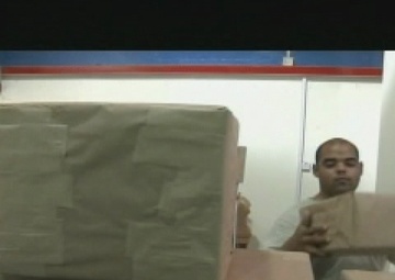 Soldiers Oversee Mail - Package