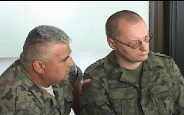K-FOR and Kosovo Security Forces conduct an inspection of a battery factory